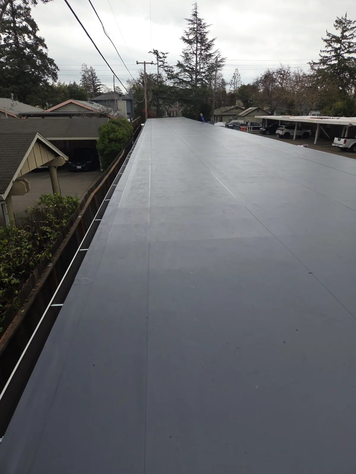 Gray flat membrane roof on a Sonoma County apartment building