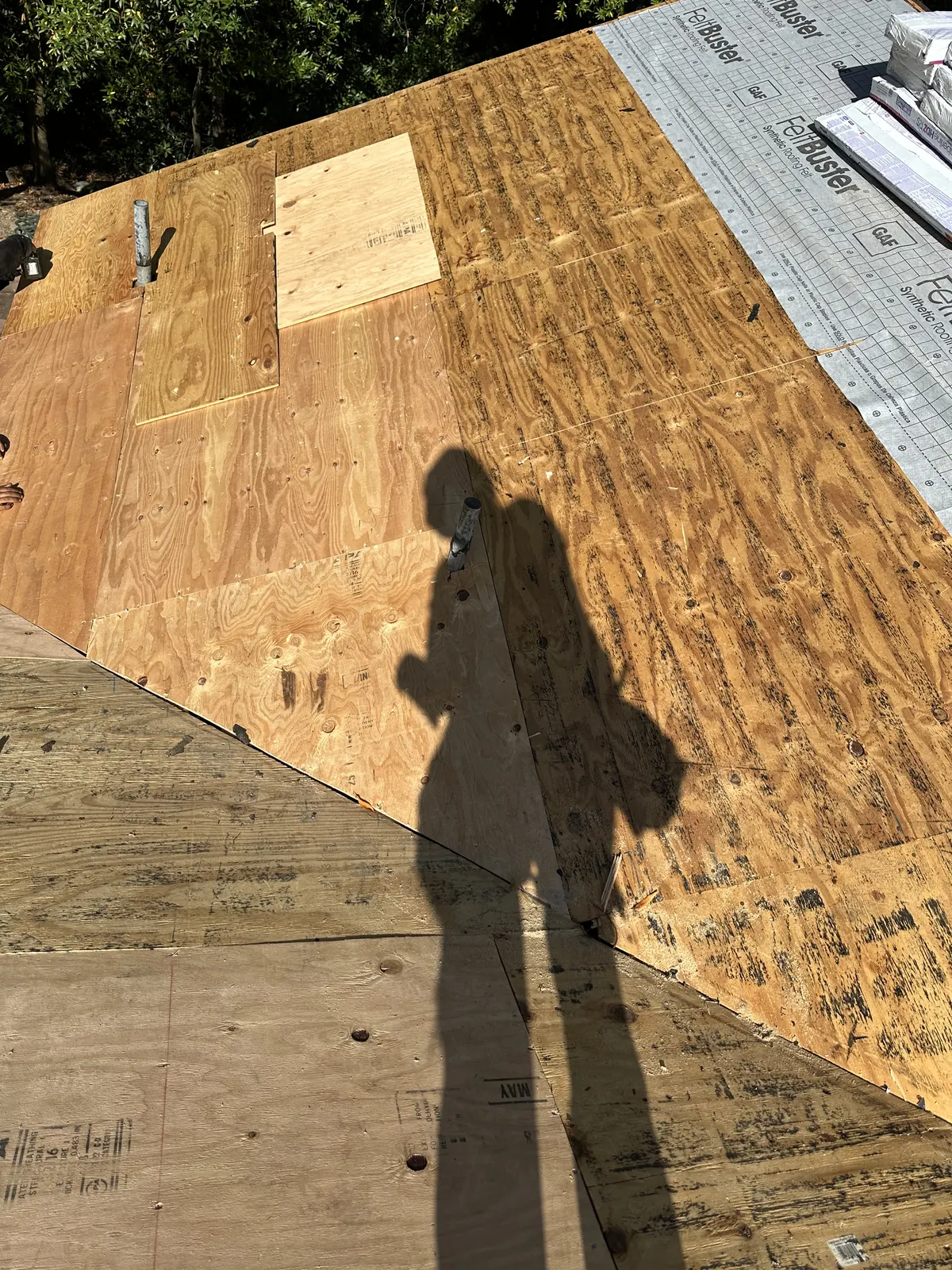 GAF FeltBuster synthetic underlayment installed over new plywood roof decking during a Sonoma re-roof