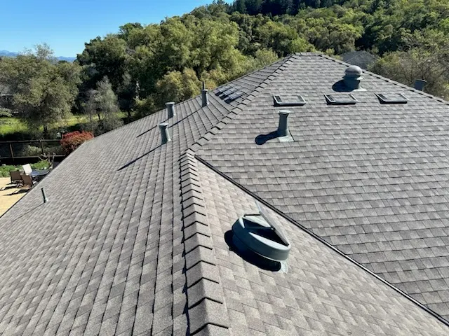 New roof on a hillside Santa Rosa home among oak trees